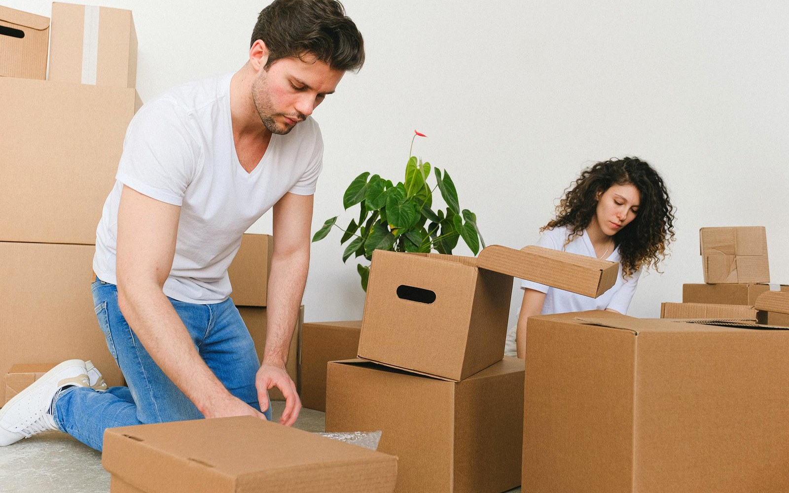 Furniture and moving boxes arriving at a home