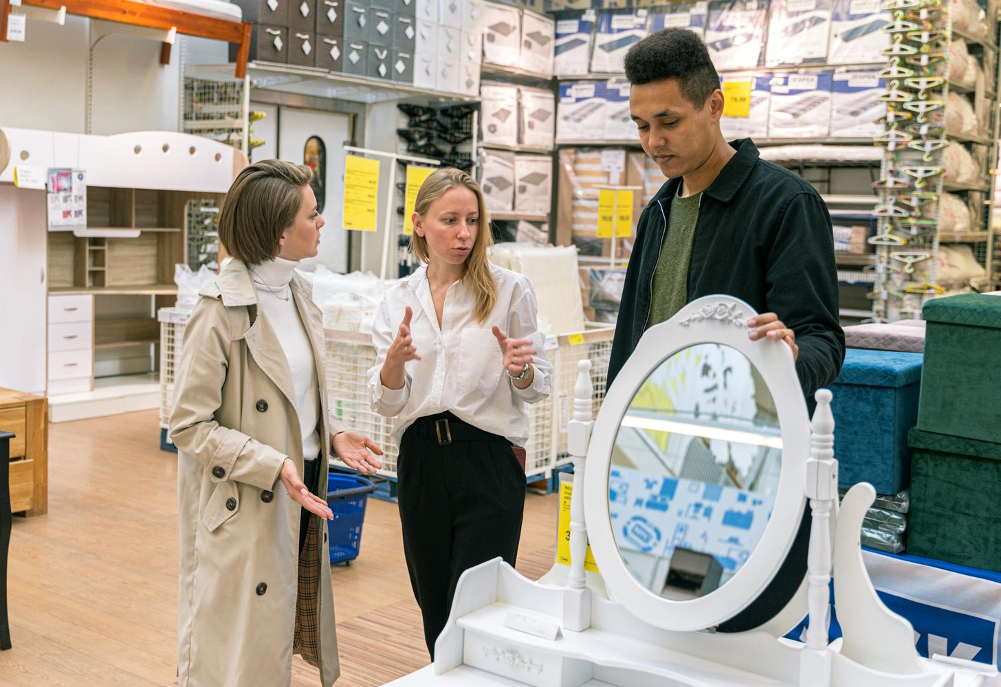 Clients selecting furniture and products in a showroom